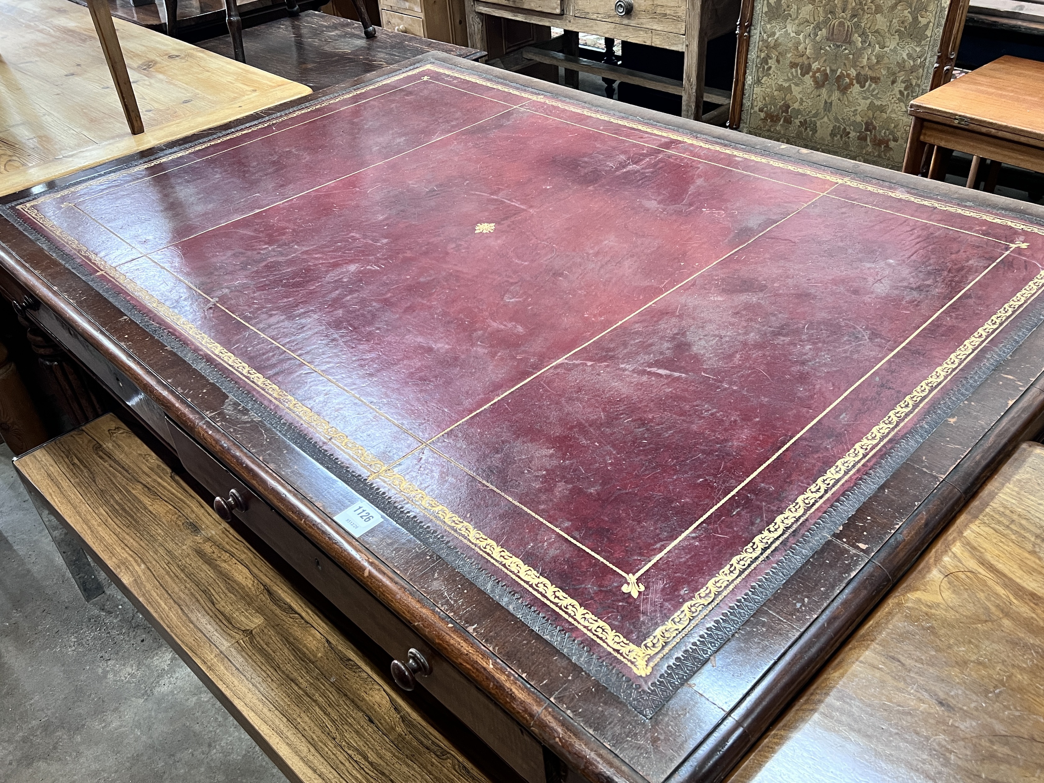 A mid Victorian mahogany partner’s writing table, width 156cm, depth 109cm, height 76cm